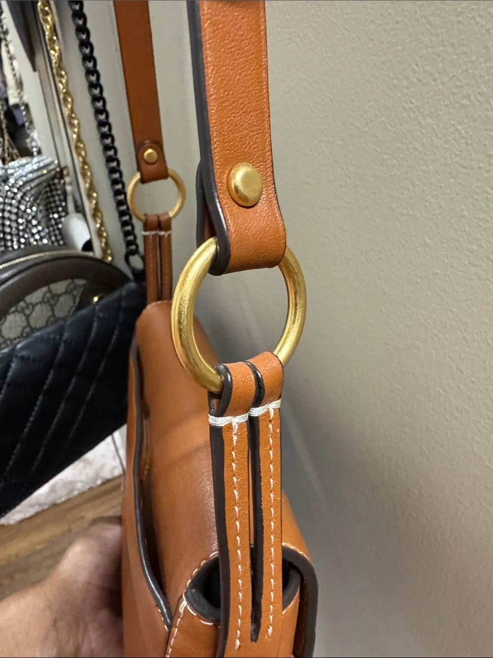 Tory Burch Cognac Leather Logo Tassel Crossbody in excellent condition.